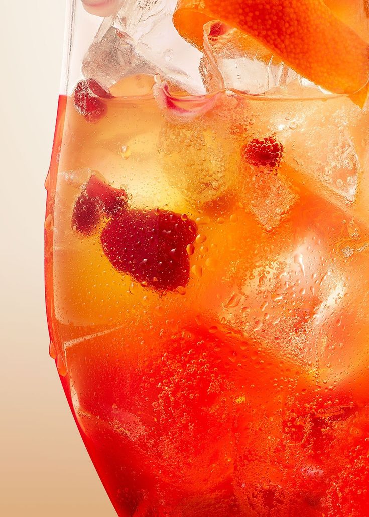 Closeup of Bomb Blend drink in glass with fruit and ice